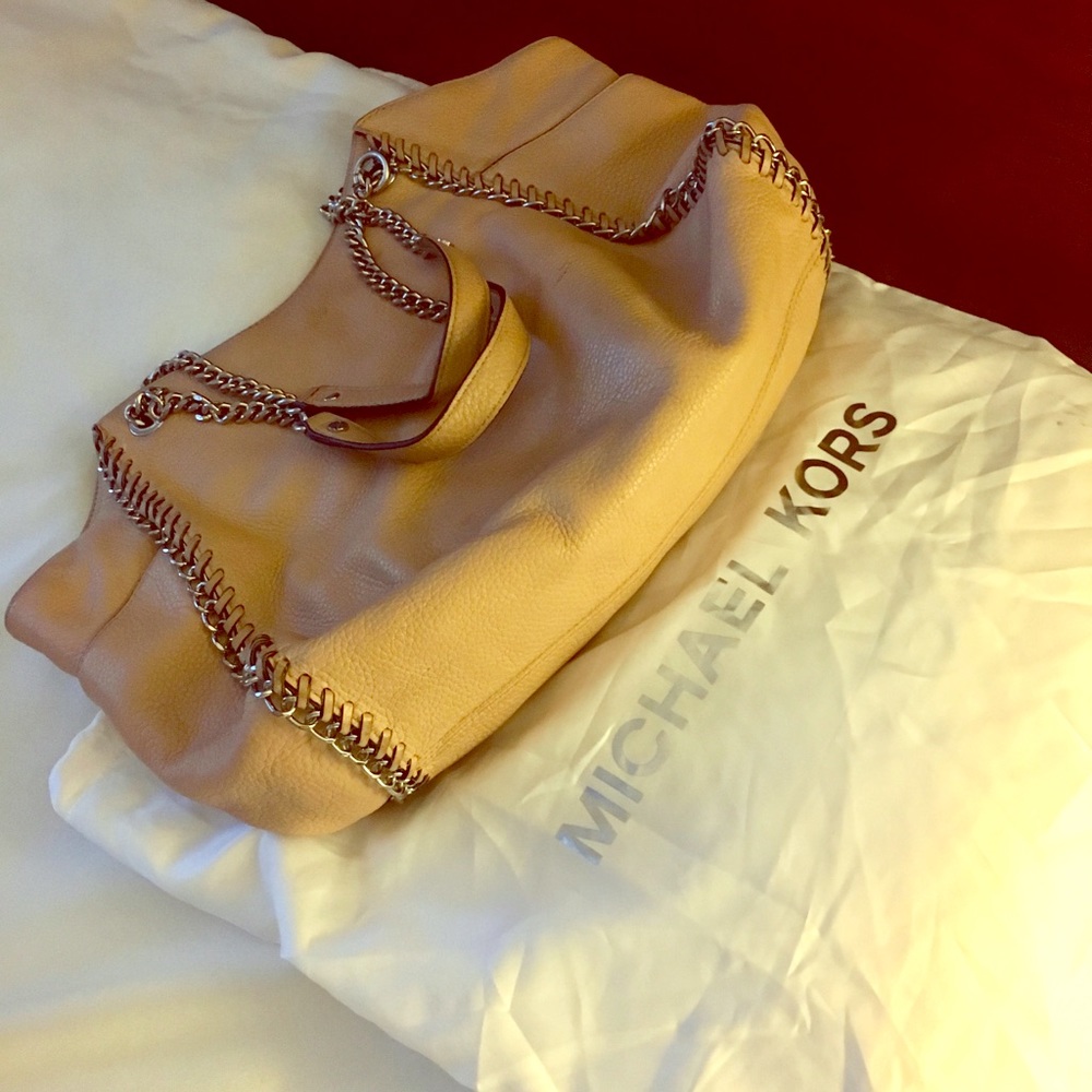 Timeless Michael Kors bag with carry pouch!